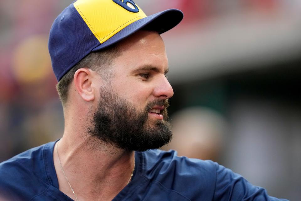 Jun 2, 2023; Cincinnati, Ohio, USA;  Milwaukee Brewers outfielder Jesse Winker converses in the dugout in the seventh inning of the MLB National League game between the Cincinnati Reds and the Milwaukee Brewers at Great American Ball Park. The Brewers won 5-4 in 11 innings. Mandatory Credit: Sam Greene-USA TODAY Sports