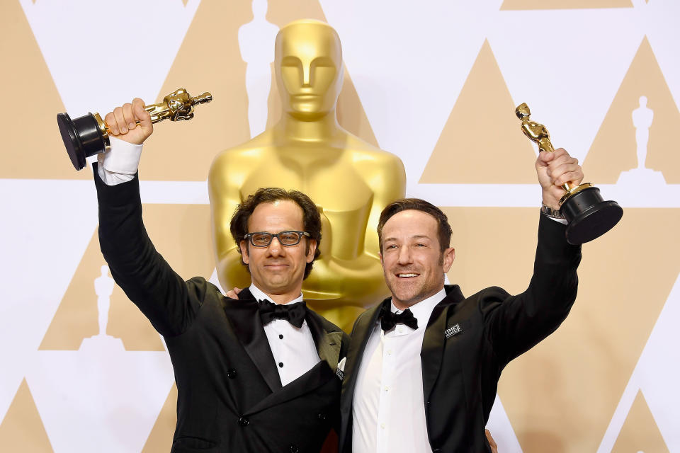 Producer Dan Cogan and director Bryan Fogel, winners of the Best Documentary Feature award for 'Icarus,' pose in the press room during the 90th Annual Academy Awards at Hollywood & Highland Center on March 4, 2018 in Hollywood.