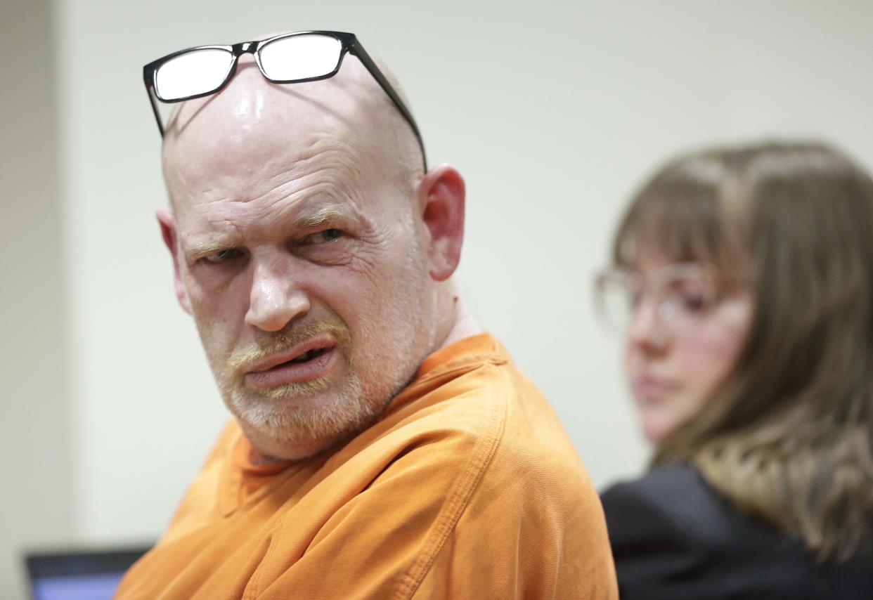 Jay Scott reacts as Outagamie County Circuit Court Judge Mark Schroeder reads his sentence Friday at the Outagamie County Courthouse in Appleton. Scott, 52, pleaded guilty in January to carjacking, theft of moveable property between $2,500 and $5,000 and felony bail jumping.