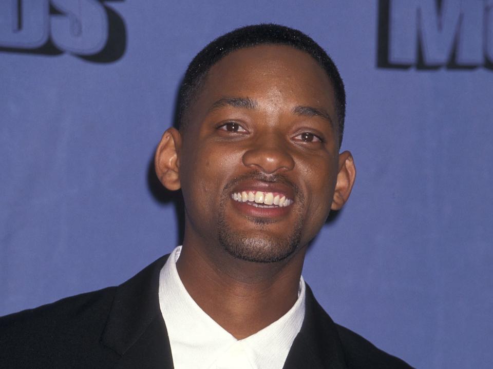 Will Smith in a black suit