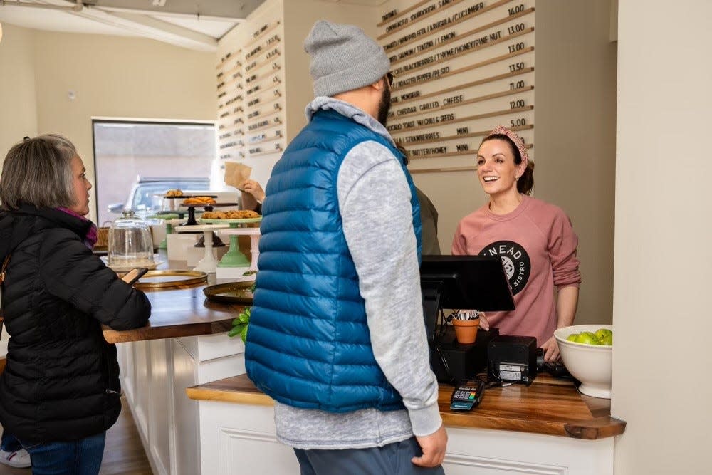 Knead Bakery and Bistro Victoria Donnelly chats with a custom at the recently opened business in Scituate.