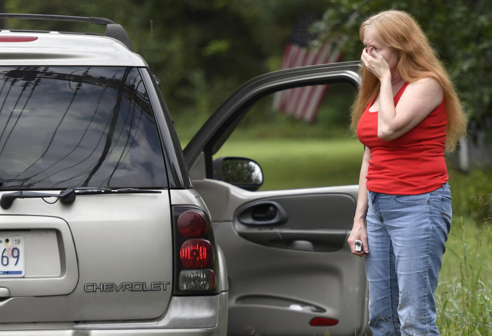 Maryland shooting: A family member of a man working in the building reacts to the news. Source: AP