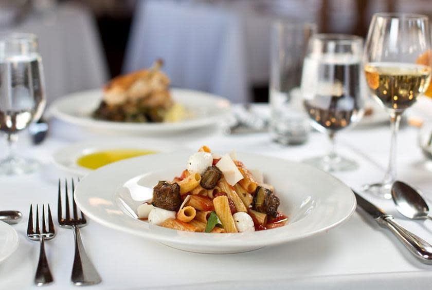 <p>Chef Paul Bartolotta’s flagship Italian restaurant has been drawing guests to the suburbs of Milwaukee since 1993, and it's simply one of <a href="https://www.thedailymeal.com/eat/best-special-occasion-restaurant-every-state-gallery?referrer=yahoo&category=beauty_food&include_utm=1&utm_medium=referral&utm_source=yahoo&utm_campaign=feed" rel="nofollow noopener" target="_blank" data-ylk="slk:the best special occasion restaurants in America" class="link ">the best special occasion restaurants in America</a>. Don't miss the uovo in raviolo (a single large truffle raviolo encasing ricotta, spinach and a whole runny egg yolk, topped with brown butter and white truffles). Other standouts include pappardelle with slow-braised duck ragù, a crisp roasted half chicken with a lemon white wine pan sauce, an assortment of grilled seafood, a wood-roasted filet of beef with pureed potatoes and Umbrian black truffle sauce, and whatever happens to be on the chef’s four-course seasonal menu that day.</p>