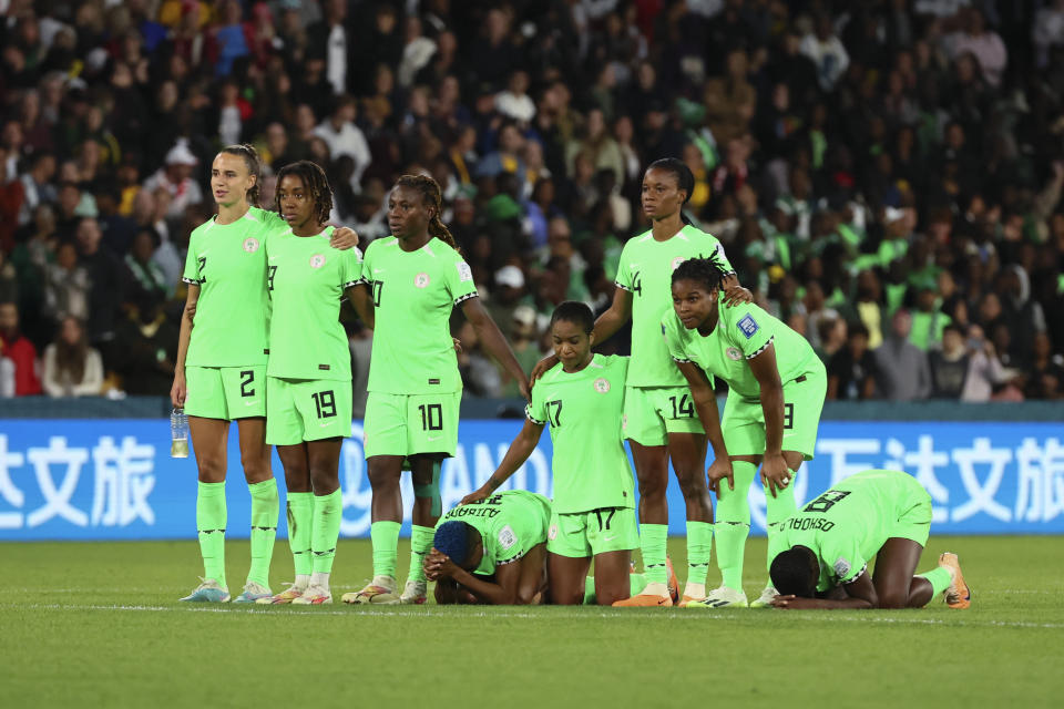 Nigeria's players react during a penalty shootout during the Women's World Cup round of 16 soccer match between England and Nigeria in Brisbane, Australia, Monday, Aug. 7, 2023. (AP Photo/Tertius Pickard)