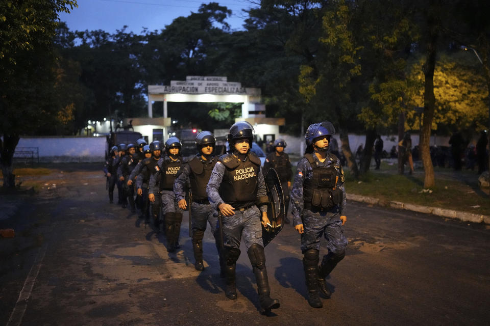 Police guard the Specialized Group building where Paraguayo Cubas, a former presidential candidate, is being held, in Asuncion, Paraguay, Friday, May 5, 2023. Police on Friday detained Cubas, a far-right populist who came in third in Sunday’s presidential election and had alleged without evidence the vote was marred by fraud. (AP Photo/Jorge Saenz)