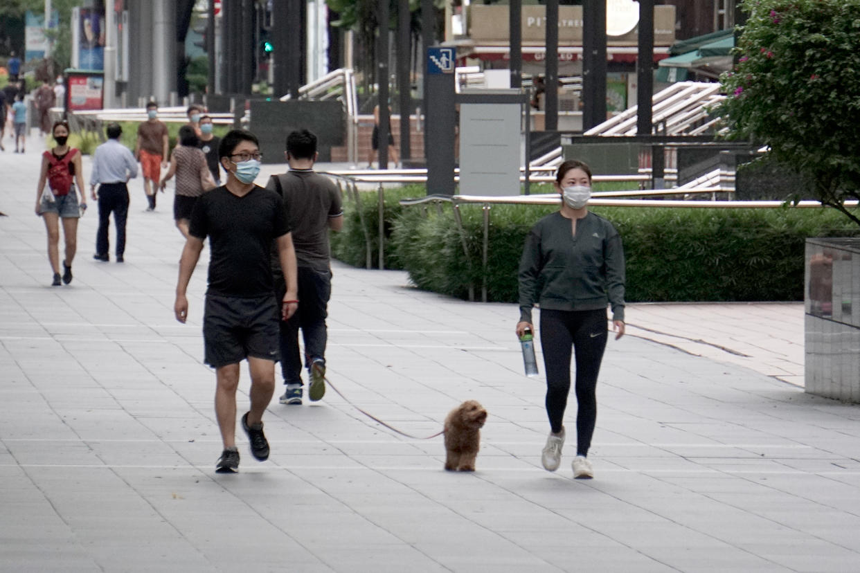 People in face masks seen along Orchard Road on 12 May 2020. (PHOTO: Dhany Osman / Yahoo News Singapore)