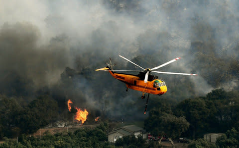  The Thomas fire is only 15 percent contained, now threatening the city of Santa Barbara and the nearby coastal town of Carpinteria - Credit:  AFP