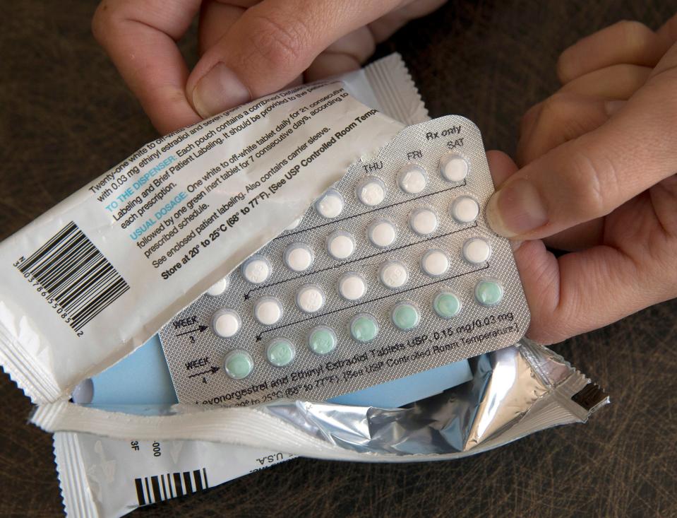 In this Aug. 26, 2016, file photo, a one-month dosage of hormonal birth control pills is displayed in Sacramento, Calif.