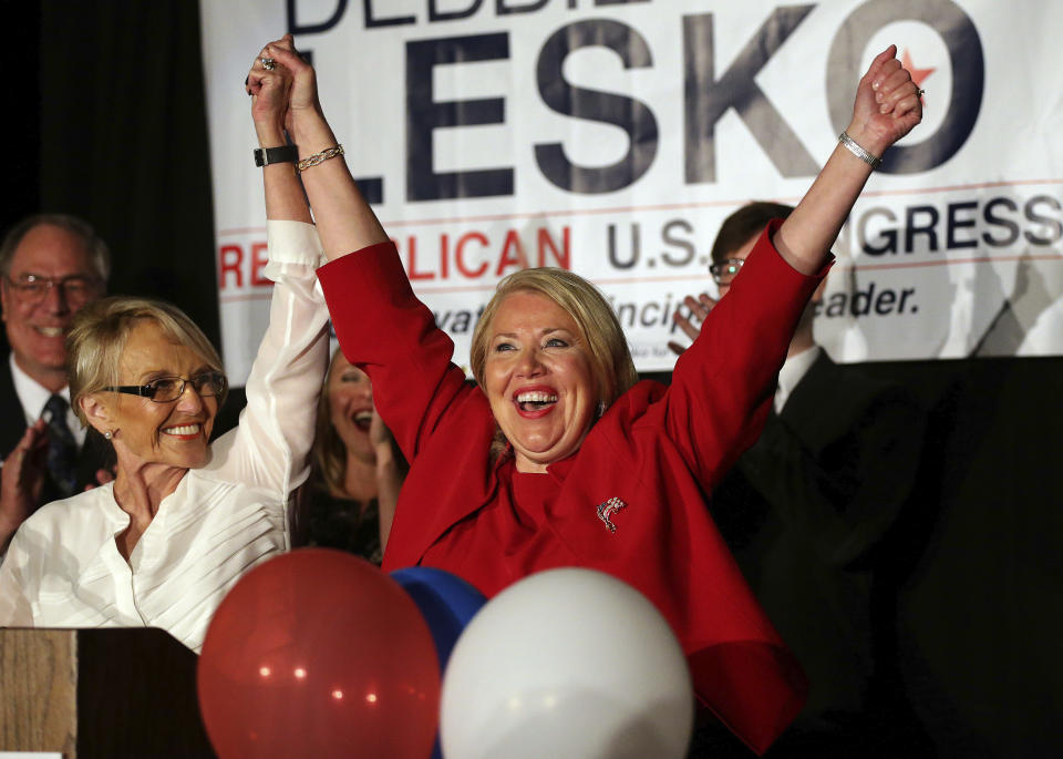 <p> Republican U.S. Congressional candidate Debbie Lesko, right, celebrates her win with former Arizona Gov. Jan Brewer at her home, Tuesday, April 24, 2018, in Peoria, Ariz. Lesko ran against Democratic candidate Hiral Tipirneni for Arizona's 8th Congressional District seat being vacated by U.S. Rep. Trent Franks, R-Arizona. (AP Photo/Matt York) </p>