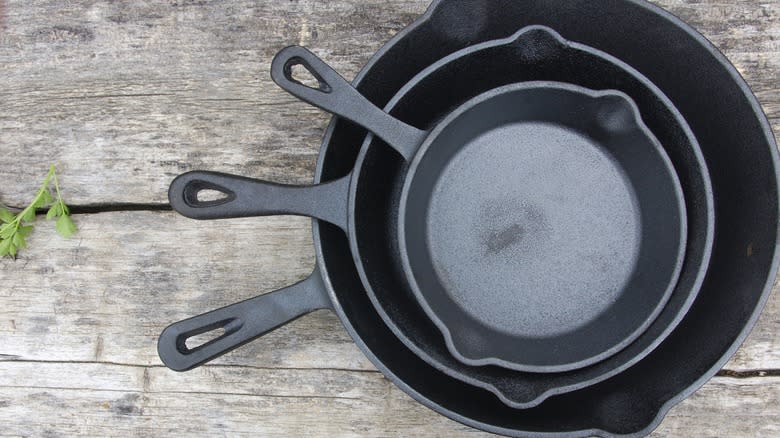 stacked cast iron pans