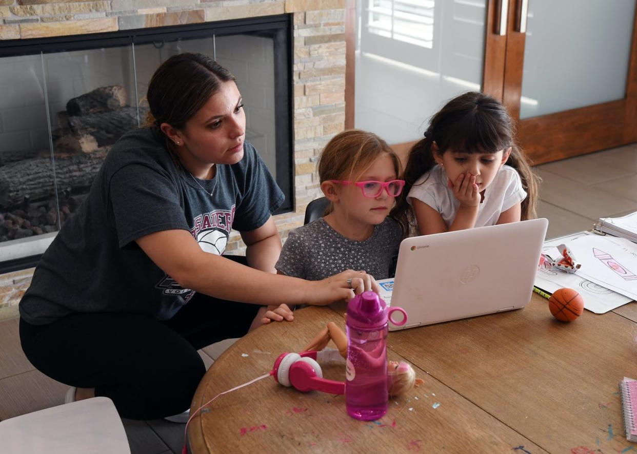 <span class="caption">Many children stuck at home during the pandemic are watching more YouTube videos than ever, for both entertainment and education.</span> <span class="attribution"><a class="link " href="https://www.gettyimages.com/detail/news-photo/college-of-southern-nevada-student-jordyn-leal-tutors-news-photo/1268608752?adppopup=true" rel="nofollow noopener" target="_blank" data-ylk="slk:Ethan Miller/Getty Images;elm:context_link;itc:0;sec:content-canvas">Ethan Miller/Getty Images</a></span>