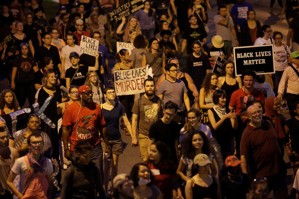 <p>People march the day after the not guilty verdict in the murder trial of Jason Stockley, a former St. Louis police officer, charged with the 2011 shooting of Anthony Lamar Smith, who was black, in St. Louis, Mo., Sept. 16, 2017. (Photo: Joshua Lott/Reuters) </p>