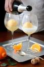 <p>Liquor up your dessert.</p><p>Get the recipe from <a href="http://www.completelydelicious.com/2012/12/tangerine-sorbet-champagne-floats.html" rel="nofollow noopener" target="_blank" data-ylk="slk:Completely Delicious;elm:context_link;itc:0;sec:content-canvas" class="link ">Completely Delicious</a>.</p>