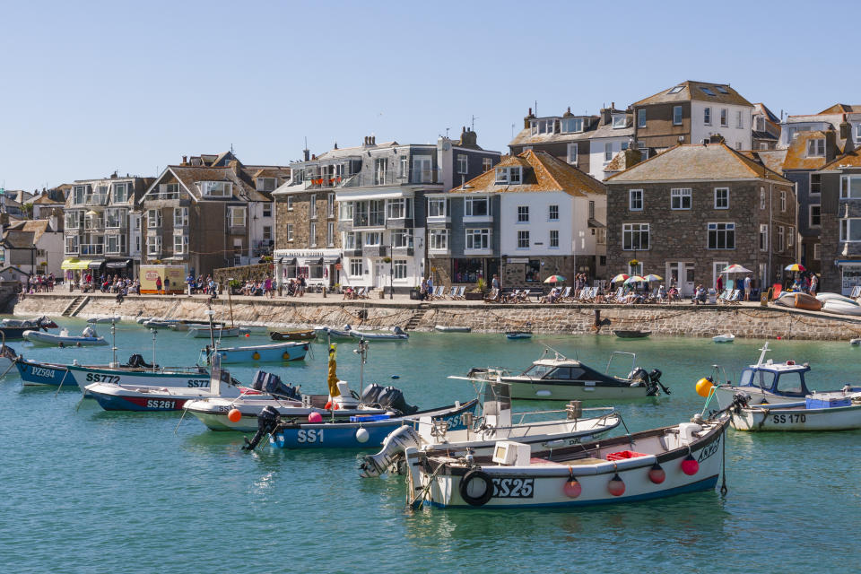 The buzzing harbour at St Ives is the perfect place to people watch. (Getty Images)