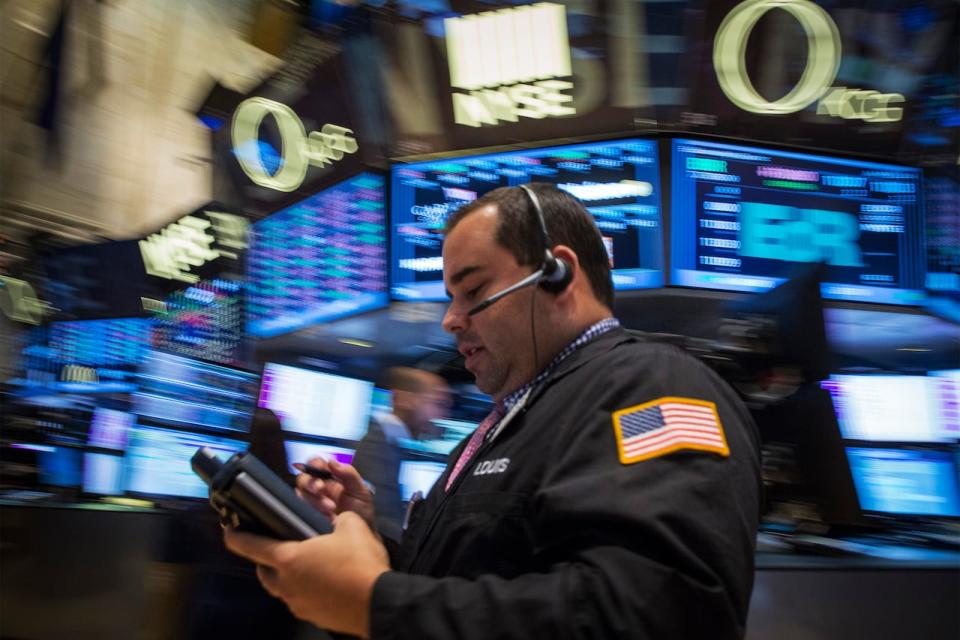 A trader works on the floor of the New York Stock Exchange July 17, 2014. U.S. stocks fell sharply lower on Thursday, with the S&P 500 posting its biggest one-day percentage drop since April 10 on news that a Malaysian Airlines passenger jet crashed near the Ukraine-Russia border. The Dow Jones industrial average fell 161.39 points or 0.94 percent, to end at 16,976.81. REUTERS/Brendan McDermid (UNITED STATES - Tags: BUSINESS DISASTER TRANSPORT)