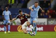 Britain Football Soccer - Burnley v Stoke City - Premier League - Turf Moor - 4/4/17 Burnley's Joey Barton in action with Stoke City's Charlie Adam Reuters / Phil Noble Livepic