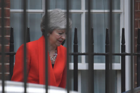 British Prime Minister Theresa May leaves the back of Downing Street, in London, Britain, May 24, 2019. REUTERS/Toby Melville