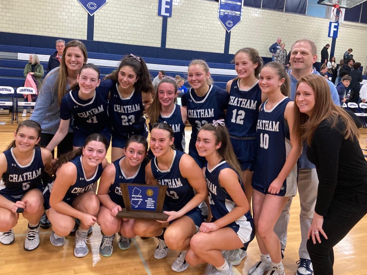 The Chatham girls basketball team celebrates after defeating Colonia to win the NJSIAA North 2, Group 3 title on March 2, 2024.