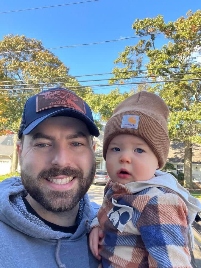 Diller with his 1-year-old son.