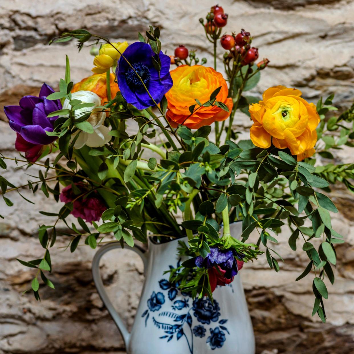  A flower bouquet in a jug. 