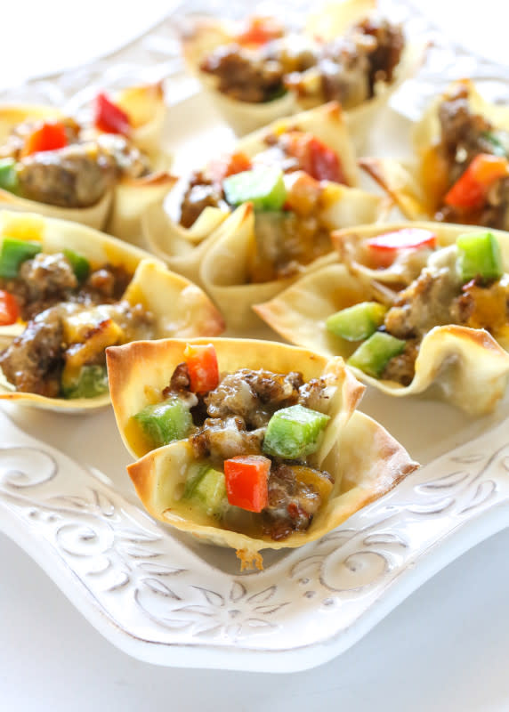 <p>Christy Denney</p><p>Crispy wonton cups are filling sausage, cheese and veggies.</p><p><strong>Get the recipe: <a href="https://parade.com/842500/communitytable/sausage-wonton-stars/" rel="nofollow noopener" target="_blank" data-ylk="slk:Sausage Wonton Stars;elm:context_link;itc:0;sec:content-canvas" class="link ">Sausage Wonton Stars</a></strong></p><p><strong>Related: <a href="https://parade.com/848511/sheagoldstein/10-inventive-ways-with-wonton-and-eggroll-wrappers/" rel="nofollow noopener" target="_blank" data-ylk="slk:12 Inventive Recipes To Make With Wonton and Egg Roll Wrappers;elm:context_link;itc:0;sec:content-canvas" class="link ">12 Inventive Recipes To Make With Wonton and Egg Roll Wrappers</a></strong></p>