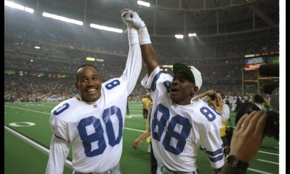 30 Jan 1994:  Dallas Cowboys wide receivers Alvin Harper (left) and Michael Irvin celebrate during Super Bowl XXVIII against the Buffalo Bills at the Georgia Dome in Atlanta, Georgia.  The Cowboys won the game, 30-13. Mandatory Credit: Jonathan Daniel  /A