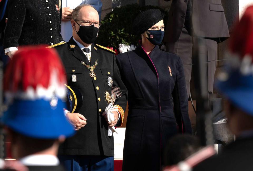 <p>For National Day, she wore a black double-faced dress coat with fuschia lining by South African designer Terrence Bray, a friend she has collaborated with since 2011.</p> <p>"She has very good taste," her husband Prince Albert tells PEOPLE, "and a good team of people around her, looking out for things that she'd like or want.</p> <p>"But she's able to recycle the different elements into new pieces. Like the coat that she wore for National Day, for example, was actually restyled by a South African friend of hers. It looks new but it's actually recycled." </p>