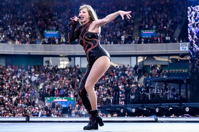 <p>Gareth Cattermole/TAS24/Getty </p> Taylor Swift onstage at the Eras Tour