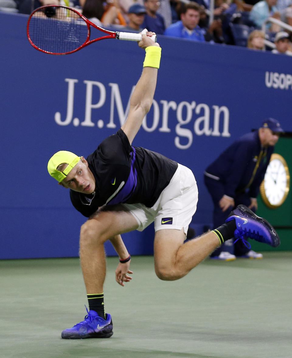 Denis Shapovalov, of Canada, returns a shot to Gael Monfils, of France, during the third round of the U.S. Open tennis tournament, Saturday, Aug. 31, 2019, in New York. (AP Photo/Jason DeCrow)