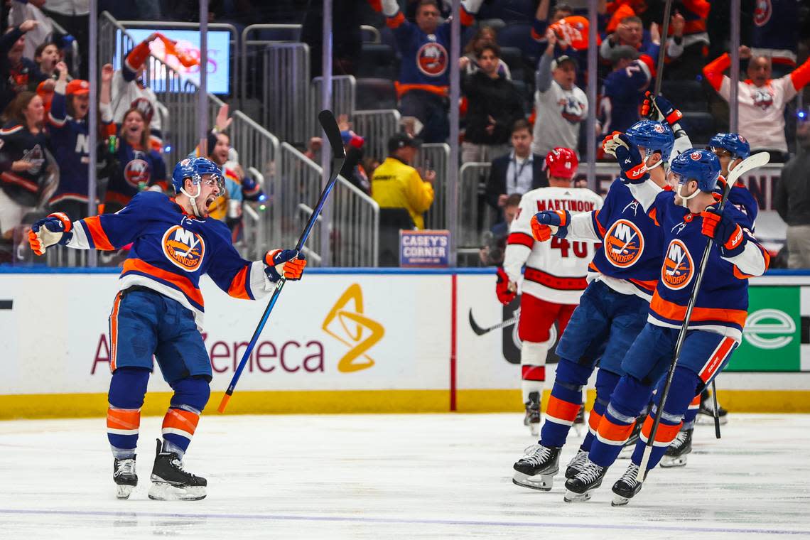 Apr 27, 2024; Elmont, New York, USA; New York Islanders center Jean-Gabriel Pageau (44) celebrates after scoring a goal in the third period against the Carolina Hurricanes in game four of the first round of the 2024 Stanley Cup Playoffs at UBS Arena. Mandatory Credit: Wendell Cruz-USA TODAY Sports
