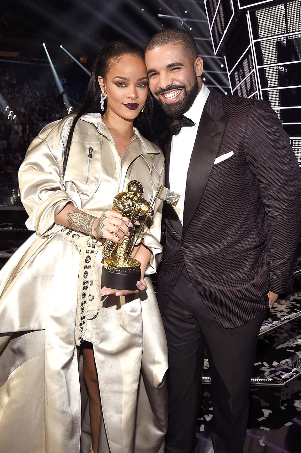 <p>The rapper and Rihanna have <a rel="nofollow noopener" href="http://www.cosmopolitan.com/entertainment/celebs/a63543/drake-rihanna-relationship-timeline-love-dating-aubrih-forever/" target="_blank" data-ylk="slk:a complicated history;elm:context_link;itc:0;sec:content-canvas" class="link ">a complicated history</a>, going back years. They had a short-lived romance in 2009 — a little too short for Drake — which prompted him to tell the <i>New York Times</i> that he felt used by Rihanna. (He <a rel="nofollow noopener" href="http://www.mtv.com/news/1641715/drake-explains-his-comments-about-rihanna/" target="_blank" data-ylk="slk:later clarified;elm:context_link;itc:0;sec:content-canvas" class="link ">later clarified</a> that he didn’t mean for his comments to come across as negative.) They continued to be flirty together — both on and off the stage — and Rihanna ex Chris Brown seemed to be at war with Drake for a while. By 2016, Drake and RiRi seemed like they might be dating again, with her kissing him at his concert in full view of everyone and his gushing about her while <a rel="nofollow" href="https://www.yahoo.com/entertainment/watch-drake-present-video-vanguard-001329323.html" data-ylk="slk:presenting;elm:context_link;itc:0;sec:content-canvas;outcm:mb_qualified_link;_E:mb_qualified_link;ct:story;" class="link  yahoo-link">presenting</a> her with the Video Vanguard Award at the 2016 MTV VMAs. “She’s someone I’ve been in love with since I was 22 years old,” he said. Think they’ll ever get back together? (Photo: Kevin Mazur/WireImage) </p>