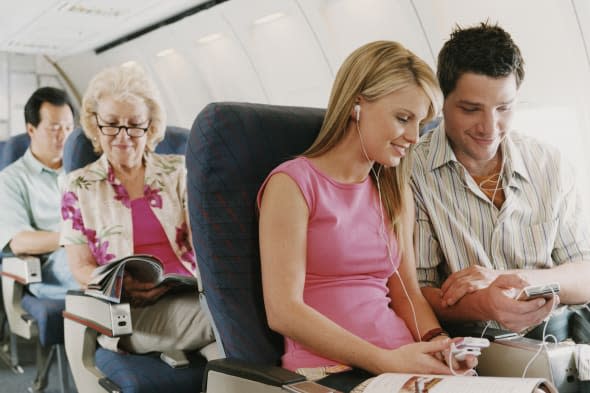 Passengers Sitting on a Plane