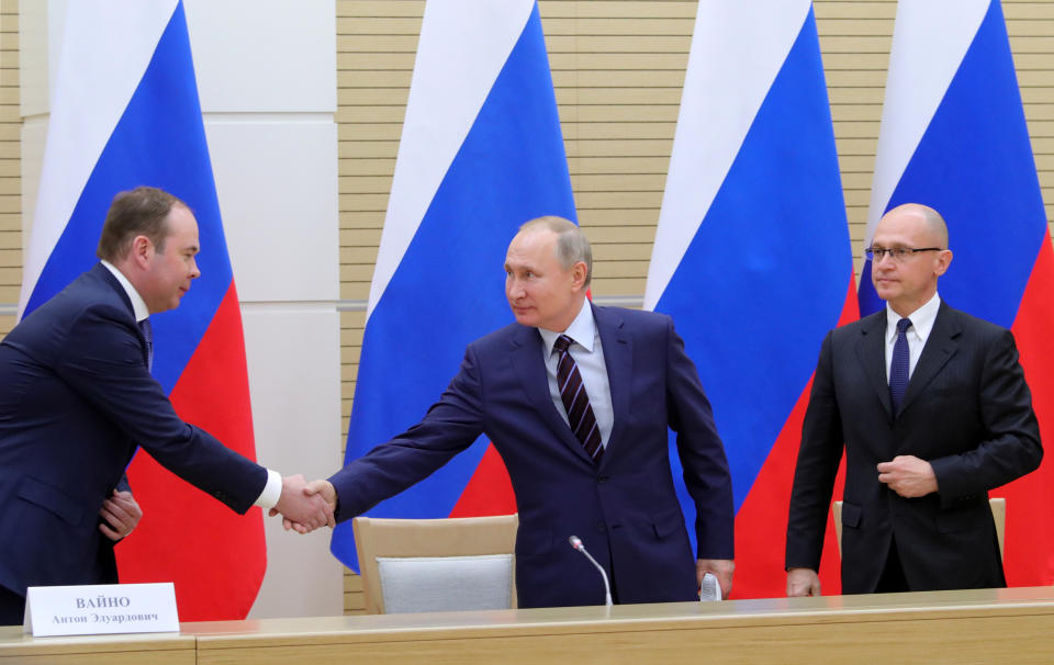 Russian President Vladimir Putin shakes hands with Chief of Staff of the Presidential Executive Office Anton Vaino next to First Deputy Chief of Staff of the Presidential Office Sergei Kiriyenko before a meeting to prepare amendments to the Russian constitution at Novo-Ogaryovo state residence outside Moscow, Russia January 16, 2020. Sputnik/Mikhail Klimentyev/Kremlin via REUTERS ATTENTION EDITORS - THIS IMAGE WAS PROVIDED BY A THIRD PARTY.