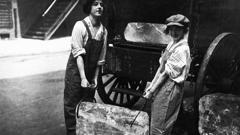 women moving blocks of ice early 1900s