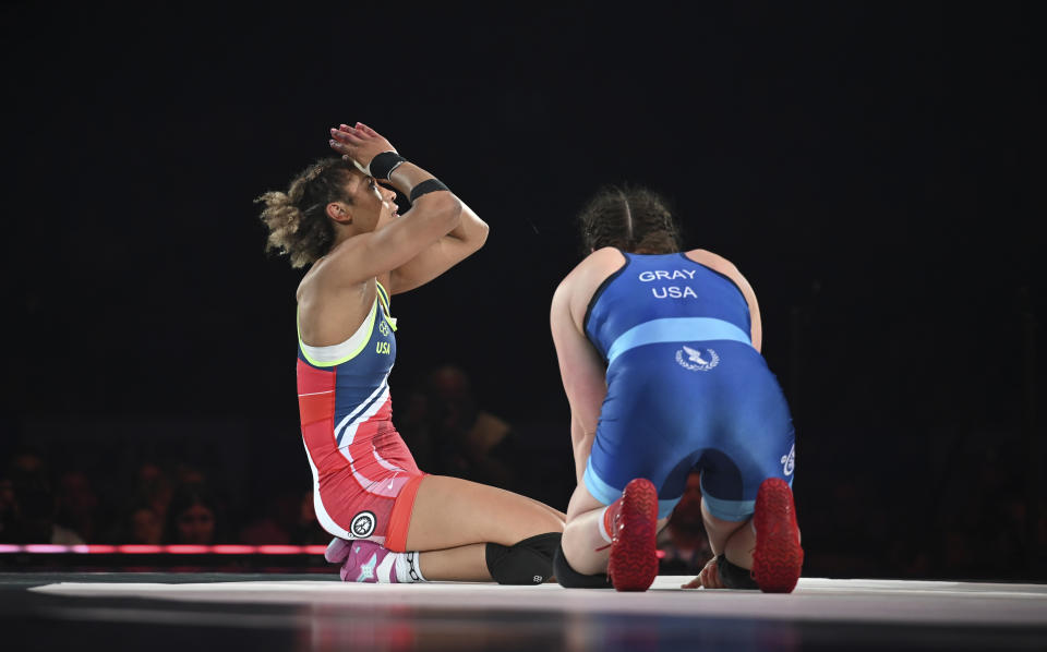 FILE - Kennedy Blades, left, celebrates her win over Adeline Gray during a 76-kilogram bout at the U.S. Olympic wrestling trials in State College, Pa., Saturday, April 20, 2024. Blades initially struggled to fully appreciate her biggest moment on the mat. Her mind already was on Olympic gold. (AP Photo/Jackson Ranger, File)