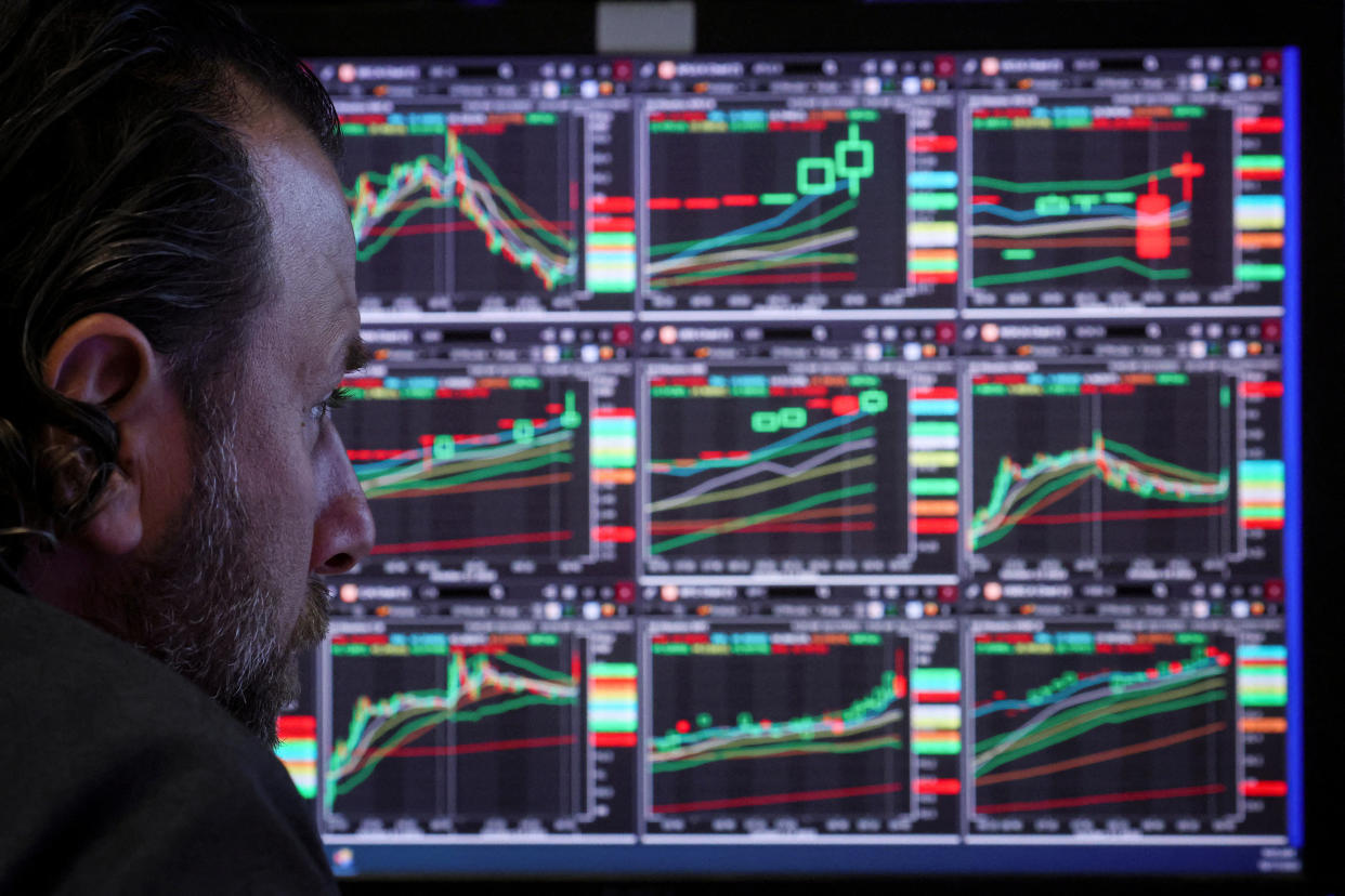 A specialist trader works on the floor of the New York Stock Exchange (NYSE) in New York City, U.S., October 17, 2022. REUTERS/Brendan McDermid