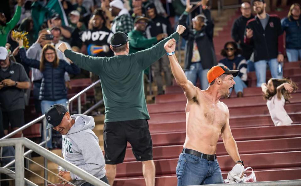 Sacramento State Hornets fans celebrate the team pulling ahead of the Stanford Cardinal during the fourth quarter Saturday.