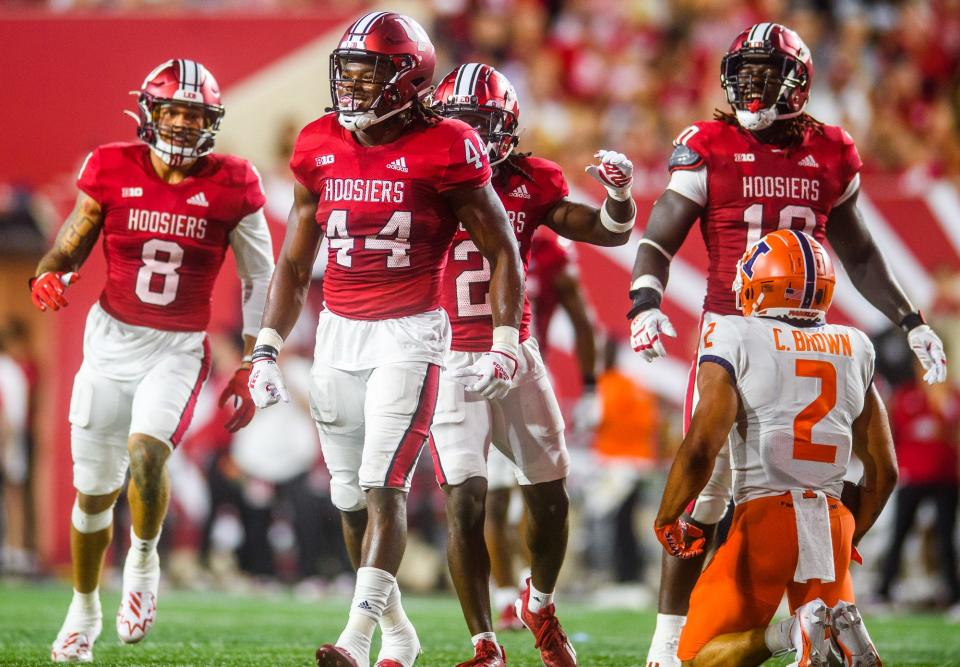 Indiana's Aaron Casey (44) celebrates his backfield tackle of Illinois' Chase Brown (2) during the Indiana versus Illinois football game at Memorial Stadium on Friday, Sept. 2, 2022.