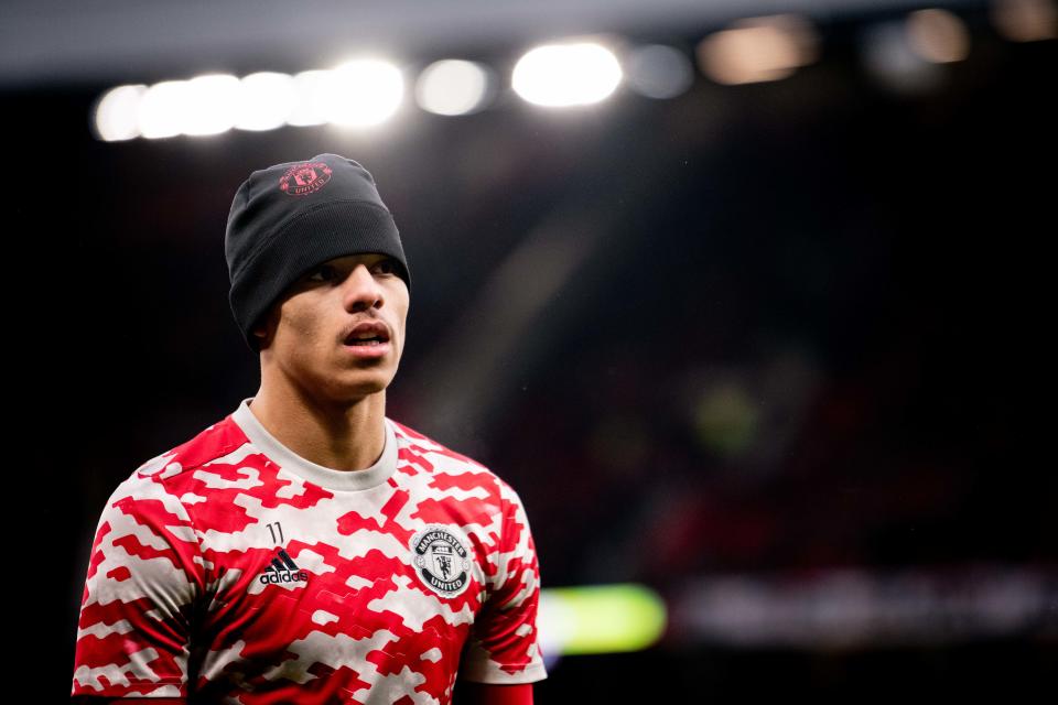 MANCHESTER, ENGLAND - JANUARY 22:    Mason Greenwood of Manchester United warms up prior to the Premier League match between Manchester United and West Ham United at Old Trafford on January 22, 2022 in Manchester, United Kingdom. (Photo by Ash Donelon/Manchester United via Getty Images)