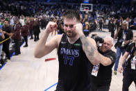 Dallas Mavericks' Luka Doncic celebrates the teams win in Game 6 of an NBA basketball second-round playoff series against the Oklahoma City Thunder Saturday, May 18, 2024, in Dallas. (AP Photo/Tony Gutierrez)