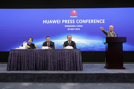 Huawei's Chief Legal Officer Song Liuping (2nd L) and Huawei's Western Europe President Vincent Pang (3rd L) attend a news conference on Huawei’s ongoing legal action against the U.S. government’s National Defense Authorization Act (NDAA) action at the company's headquarters in Shenzhen, Guangdong province, China May 29, 2019. REUTERS/Jason Lee