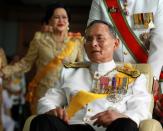 Thailand's King Bhumibol Adulyadej leaves from Siriraj hospital to the Grand Palace in Bangkok on December 5, 2011 on his 84th birthday