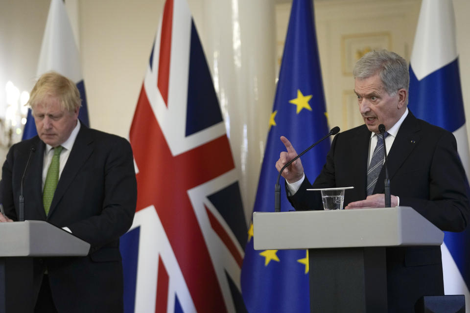British Prime Minister Boris Johnson, left, and Finland's President Sauli Niinisto meet the media at the Presidential Palace in Helsinki, Finland, Wednesday, May 11, 2022. Britain has signed a security assurance with Sweden and its neighbor Finland, both pondering whether to join NATO following Russia's invasion of Ukraine, pledging to "bolster military ties" in the event of a crisis and support both countries should they come under attack. (AP Photo/Frank Augstein, Pool)