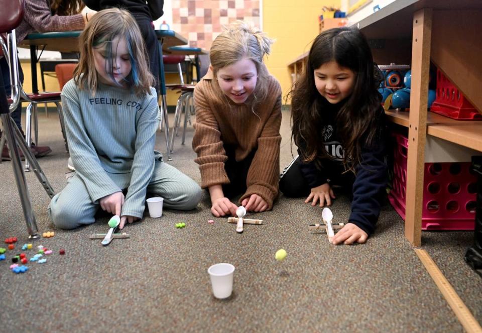 A group of third grade students test out their catapults during STEM class at Park Forest Elementary on Thursday, Jan. 26, 2023.