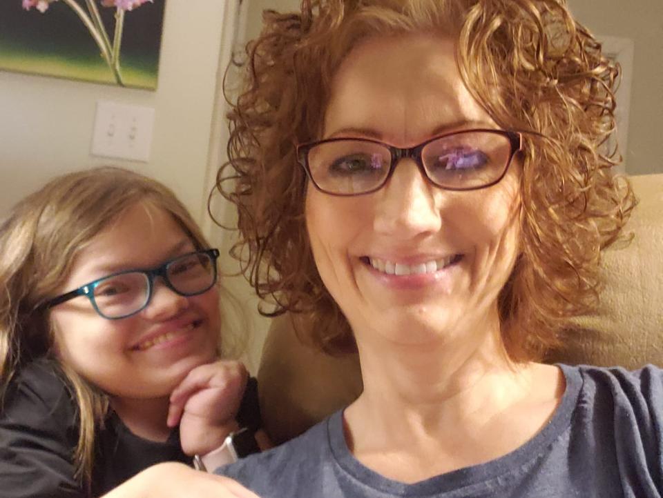 Tammy Coulter poses with her 16-year-old daughter, Ava