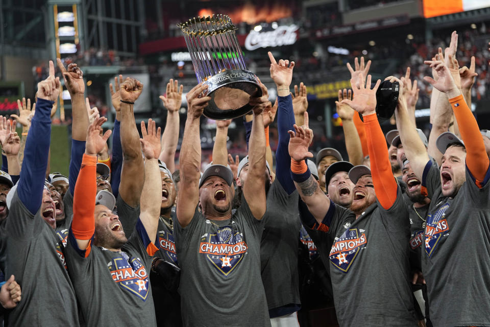 The Houston Astros celebrate their 4-1 World Series win against the Philadelphia Phillies in Game 6 on Saturday, Nov. 5, 2022, in Houston. (AP Photo/David J. Phillip)