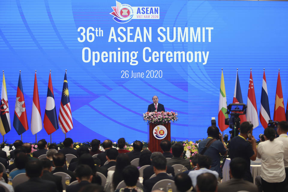 Vietnamese Prime Minister Nguyen Xuan Phuc delivers a speech at the opening ceremony of the 36th ASEAN Summit in Hanoi, Vietnam Friday, June 26, 2020. Leaders from the Southeast Asian ten-nation bloc hold the bi-annual summit via online video conference to discuss regional issues. (AP Photo/Hau Dinh)