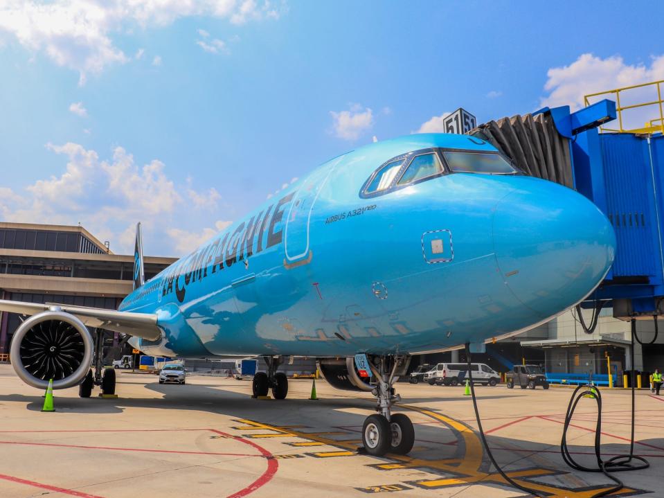 One of La Compagnie's all-business class Airbus A321neos on a runway.