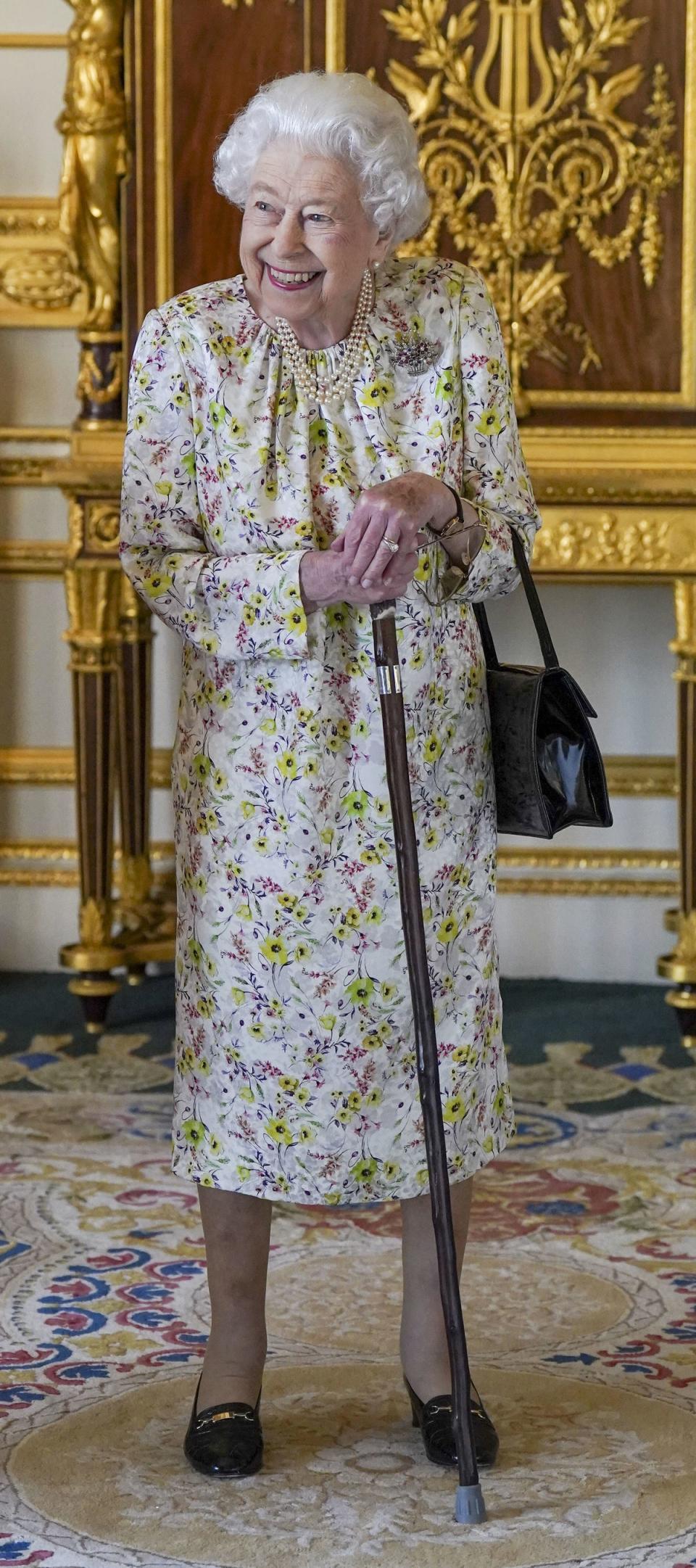 The Queen has taken to using a walking stick because of ongoing mobility difficulties (Steve Parsons/PA) (PA Wire)