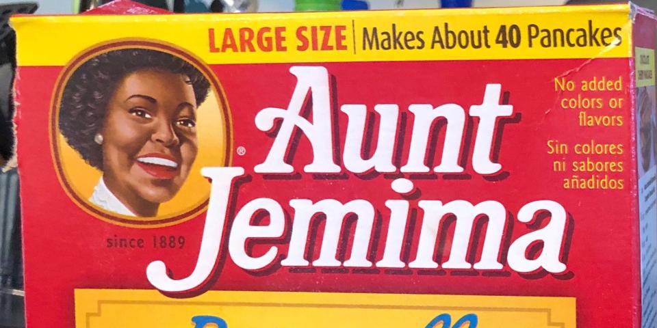 A box of Aunt Jemima pancake mix sits on a stovetop Wednesday, June 17, 2020, in Harrison, N.Y. Pepsico is changing the name and marketing image of its Aunt Jemima pancake mix and syrup, according to media reports.  A spokeswoman for Pepsico-owned Quaker Oats Company told AdWeek that it recognized Aunt Jemima’s origins are based on a racial stereotype and that the 131-year-old name and image would be replaced on products and advertising by the fourth quarter of 2020. Quaker did not say what the name would be changed to.  (AP Photo/Courtney Dittmar)